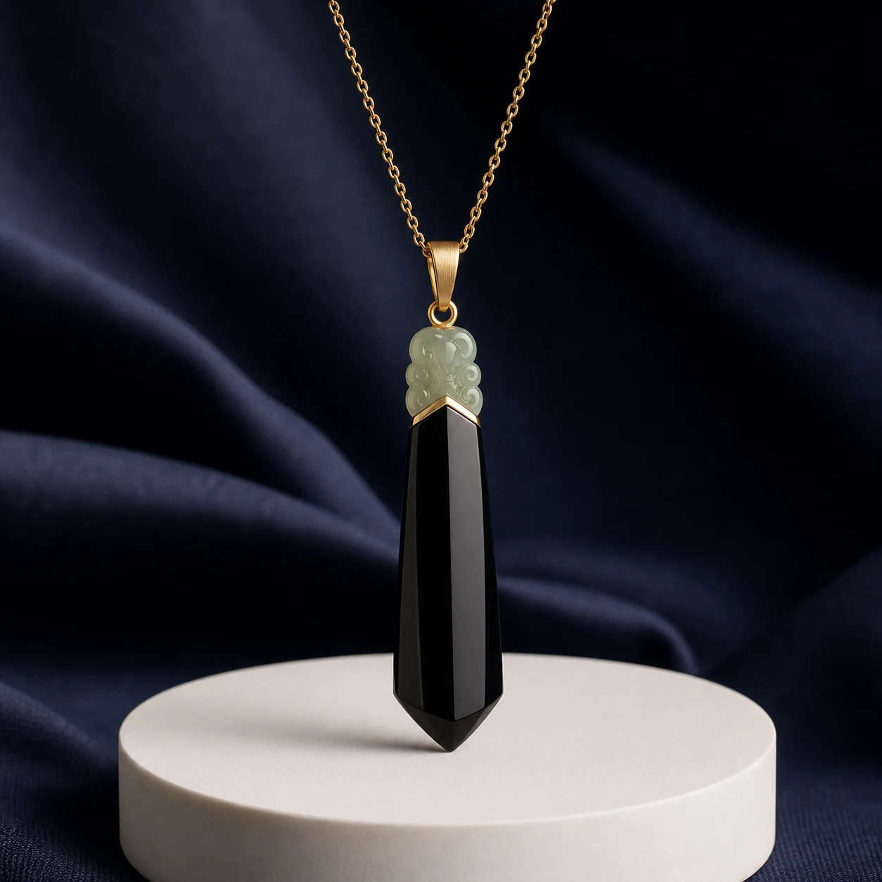 Black obsidian pendant with a polished arc profile